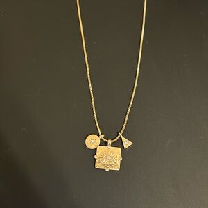 Melrose and market gold tone charm necklace, evil eye